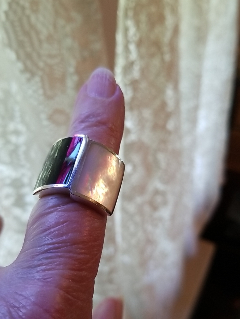 Silver ring with Onyx and Mother of Pearl Stones